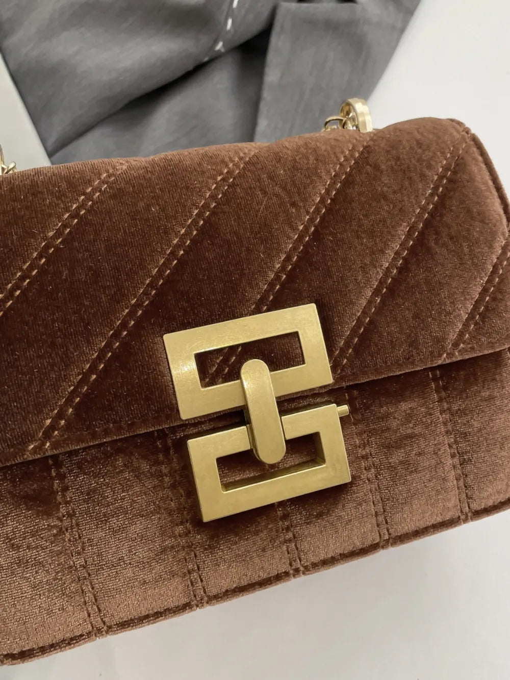 Elegant Velvet Crossbody with Gold Chain & Buckle Detail